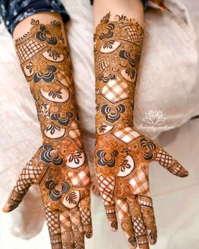 Half-and-half hand design Mehndi Designs for Girls