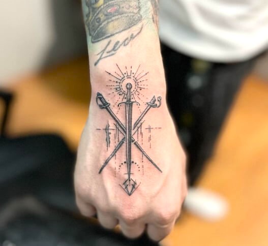 Sword or Dagger tattoo designs for men hand