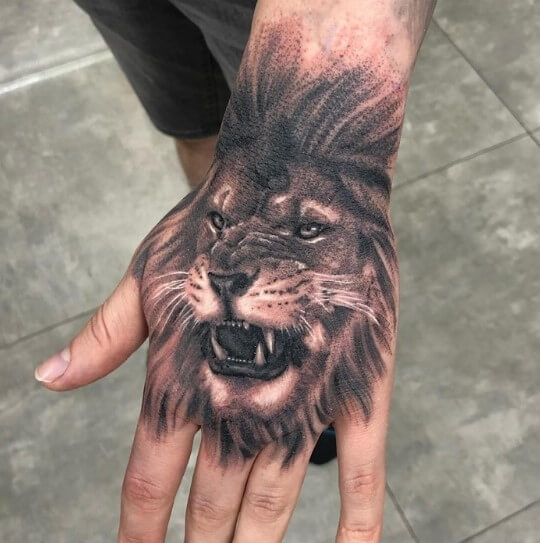 Lion Hand Tattoo