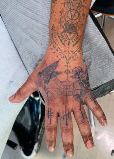 Tribal and Geometric Patterns Hand Tattoos