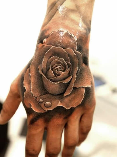 rose hand tattoo